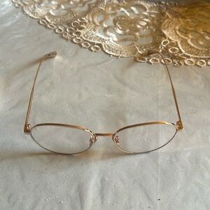 Christian Dior Gold rose glasses with transitional lenses